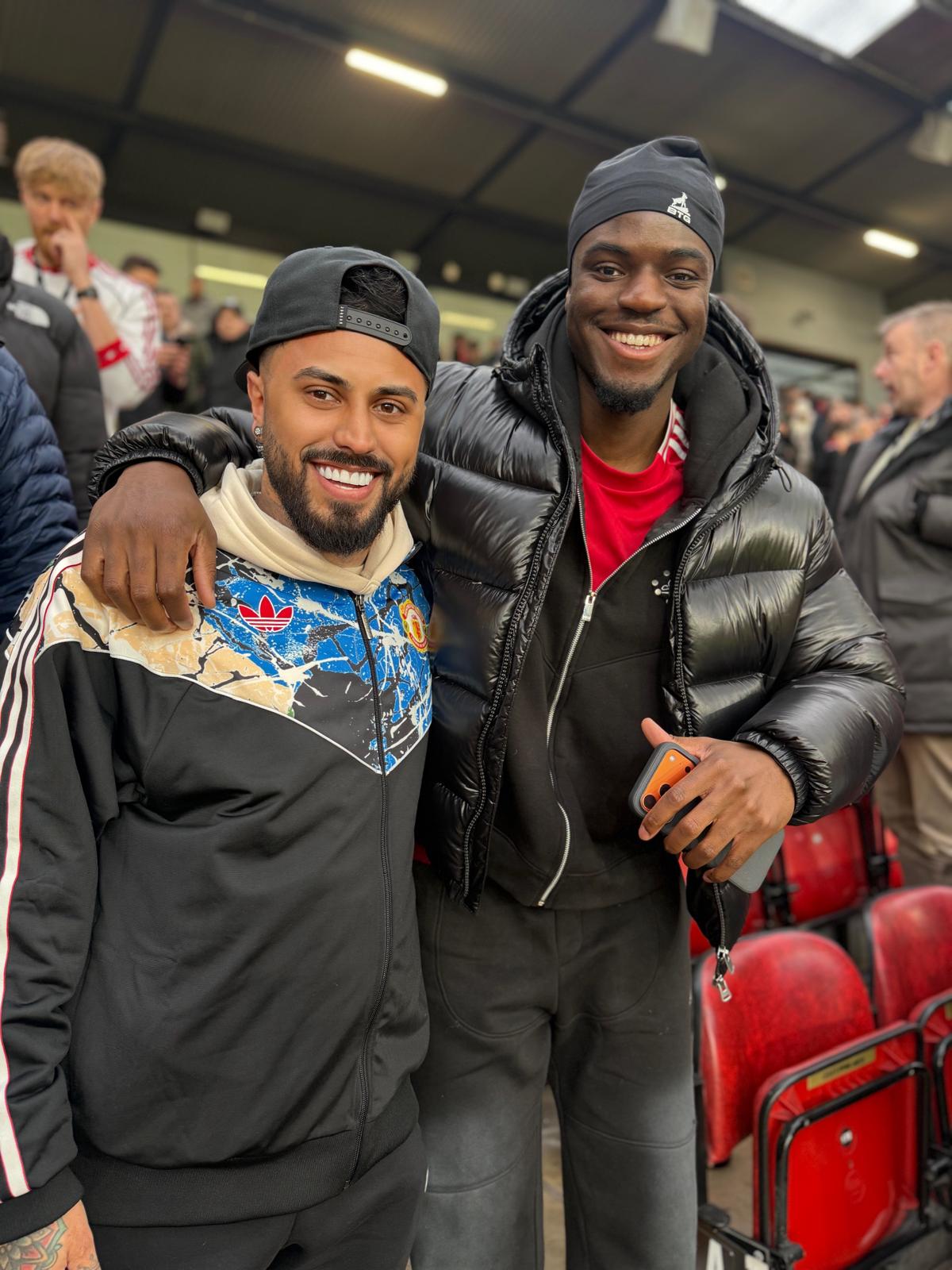 Gerryn with a fan in the Old Trafford stands