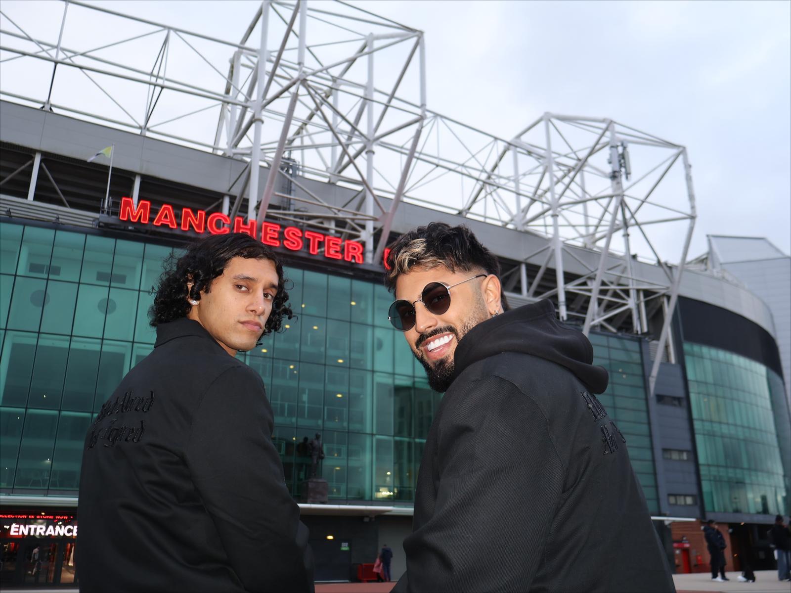 Gerryn and a friend outside Old Trafford