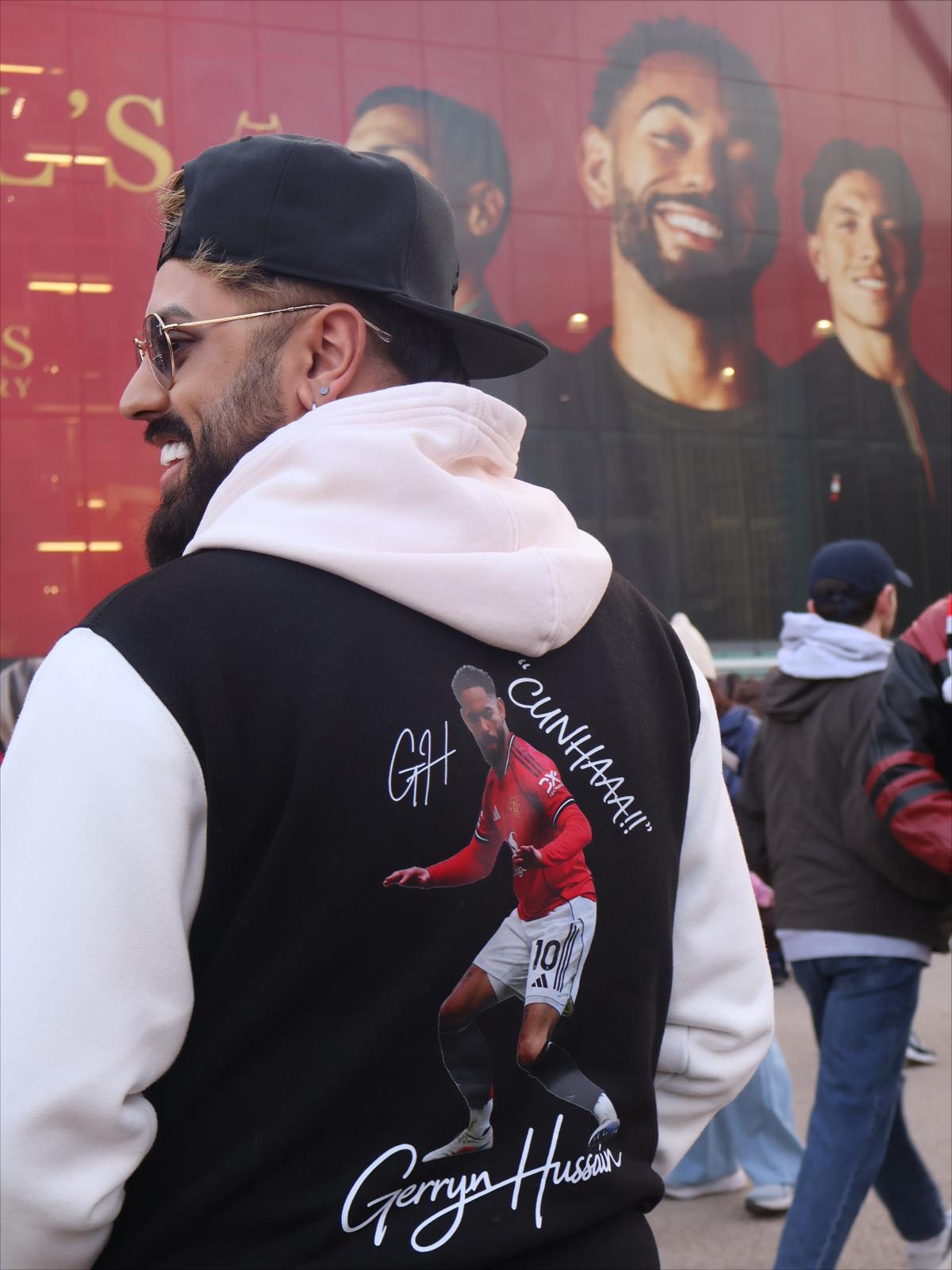 Gerryn in a custom GH Cunha jacket outside Old Trafford